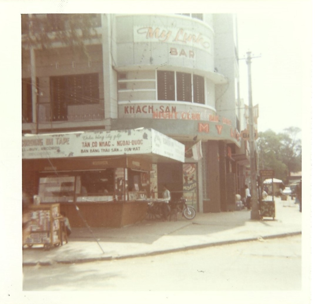 The My Linh was one of many nightclubs/bars catering to GIs on R&R. The kiosk on the left offered services to make audio reel tapes.
